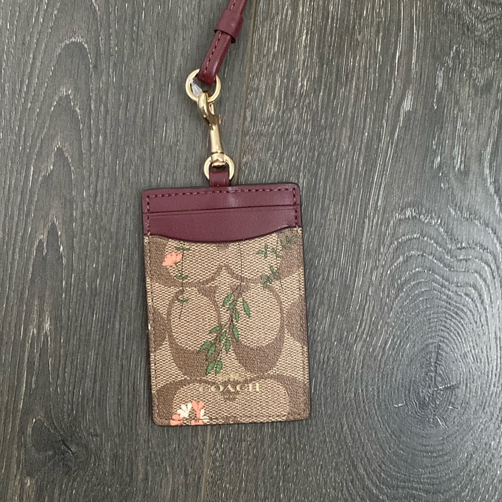 Coach ID Lanyard Brand New colors brown, tan, burgundy, with flowers and…